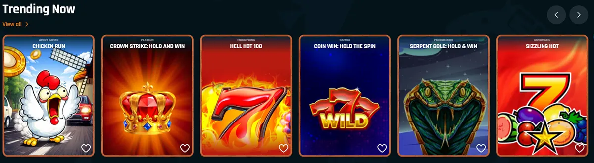 “Casino homepage ‘Trending Now’ carousel showing six slot tiles—Chicken Run, Crown Strike: Hold and Win, Hell Hot 100, Coin Win: Hold the Spin, Serpent Gold: Hold & Win, and Sizzling Hot—with heart icons and navigation arrows.”